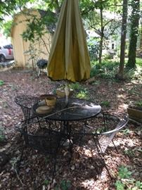 Wrought iron umbrella table w/chairs