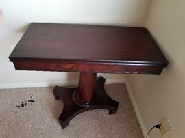Antique game table. Opens up. 