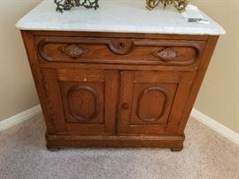 Marble-topped antique side table. 