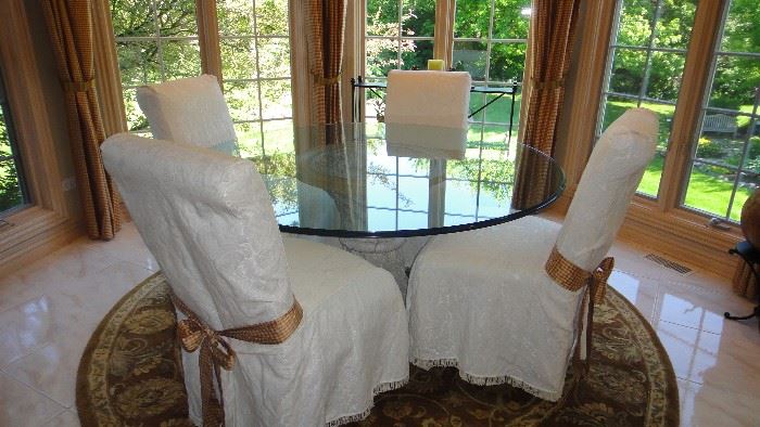 60 in round glass table, Cream pedestal, 4 slip cover chairs 