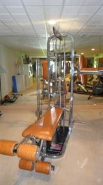Calgym Weight Machine: Comes with 4 stations and 230 LB stack as well as side 25 LB side stack for leg and golf exercises. Includes Pull down for lats, Pec Deck, Bench Press, Leg Lifts (Quads, Hams), Side Chair for doing Core. Removeable bench for rows with three different attachments. Brass Pulleys rebuilt with Steel & Ball Bearing inserted.