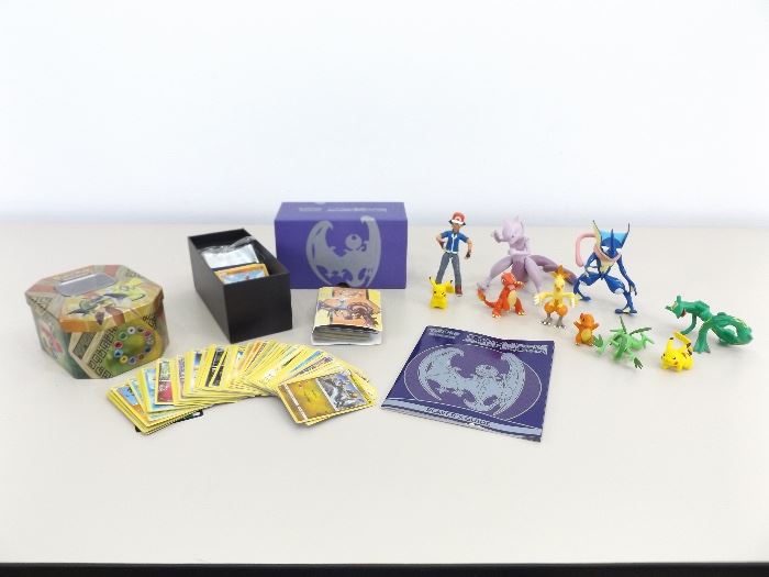 Collection of Pokemon Cards and Figures
