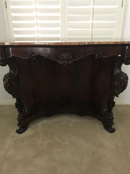 Hand carved Tuscan console with marble top
52.5” W x 23”D x 37.5”H
$3700