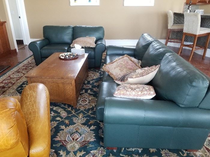 Leather loveseat  and distressed chair available; sofa removed by owner