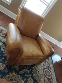 Distressed leather arm chair