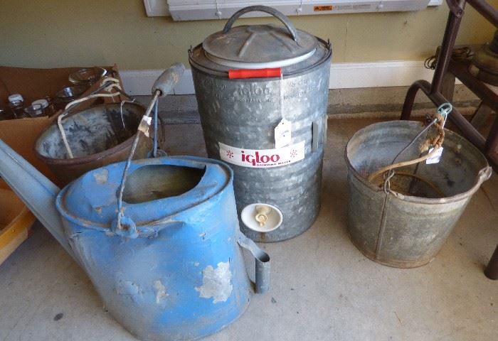 Mr. Hutchinson's old watering can, galvanized Igloo beverage cooler, old well buckets