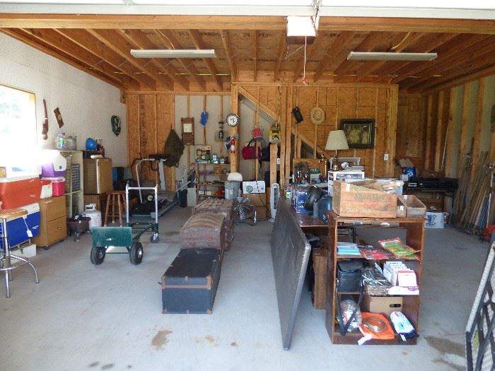 Detached garage full of useful items 