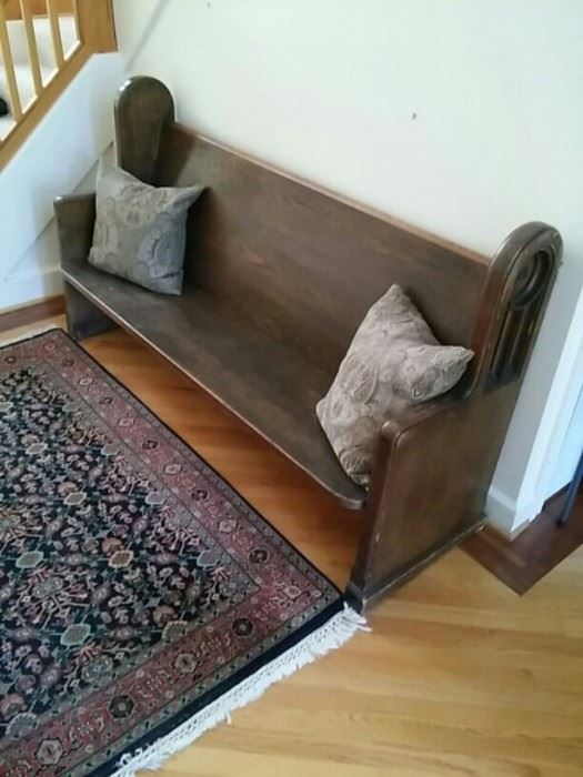 Wood Pew and Oriental Style Rug