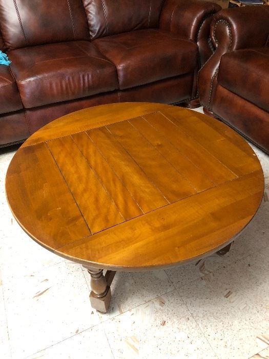 36” round wooden living room table, good condition.