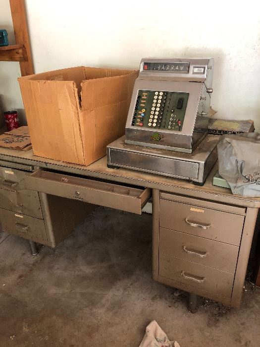 Antique metal office desk, and antique cash register. The cash register’s electric cord has been cut. We cannot get it open.