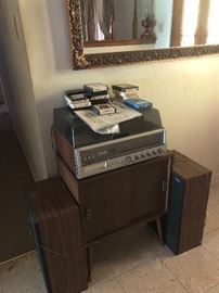 Vintage record player, stereo, and 8 track player with accompanying 8 tracks. Stereo works, knob to turn off does not. Record player arm needs a needle, and the 8 track tape player was working up until a few days ago.
