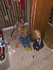 Chatty Cathy doll, has records, Ms. Beezly doll, doesn’t have apron. I cannot think of the name of the other doll.