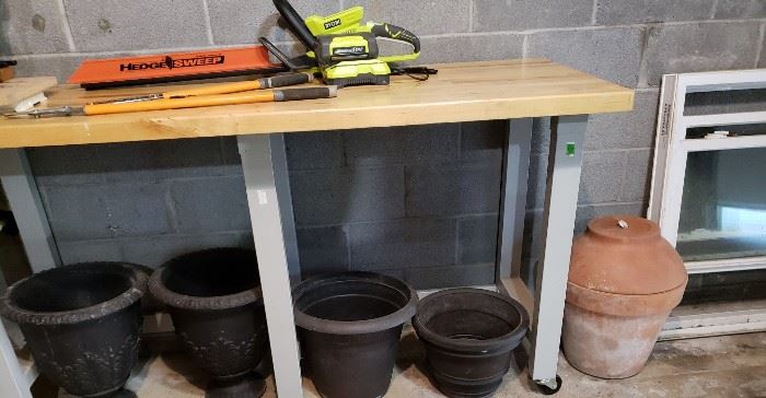 Assembly table and planters