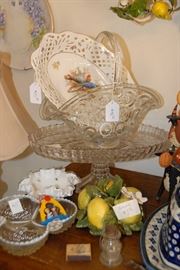 We have several cake plates, examples of "thousand eye" glassware, and Dresden