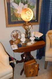 1870s to 1880s parlor table with Gone with the Wind lamp. 