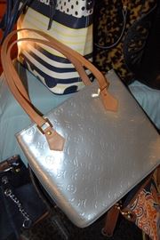 Louis Vuitton silver "Houston" style purse in unused condition