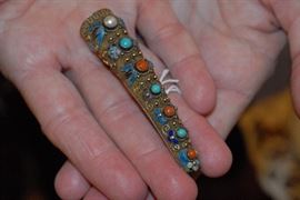 Unusual old broach. Metal has gold tone, but marked sterling. 