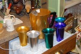 Vintage 1950s aluminum tumbler set with matching pitcher