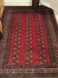 RED BOKHARA HAND KNOTTED WOOL RUG
PAKISTAN
