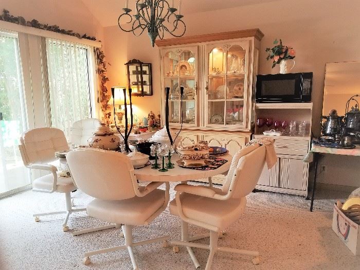 Dining table, chairs and a china cabinet