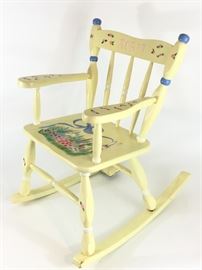 Children's Rocking Chair, Music Box Attached to Leg http://www.ctonlineauctions.com/detail.asp?id=730938