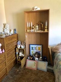 Bedroom one with dressers and bookcases 