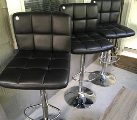 Adjustable black and chrome barstools