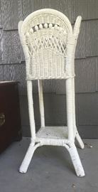 Antique wicker plant stand