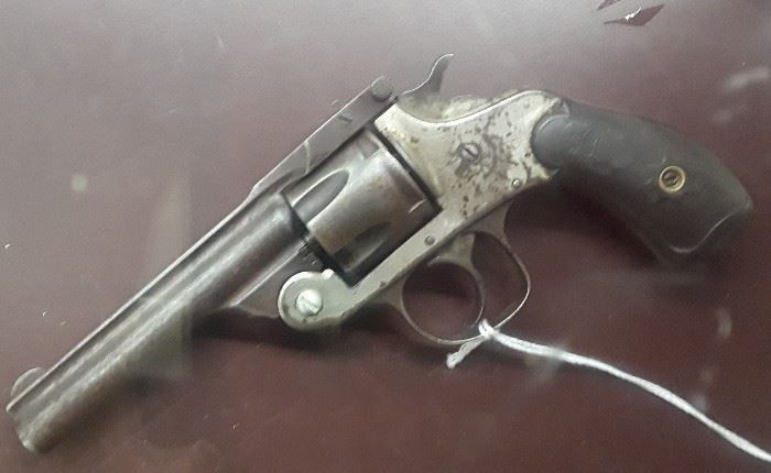 Antique 38 Cal with Badge on Grips