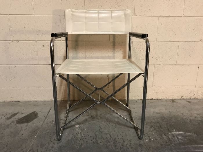 Japanese "Uchida" brand folding chair, very unique, impossible to find in this white variation, in excellent condition with no 'stretching' of the seat when opened, like most that are out there, leather and metal frame with plastic armrests, folds flat around 4" thick