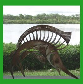 Whimsical Metal Sailfish Sculpture Sitting on the Screened In Lanai Overlooking the Fantastic View 