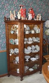 Antique Oak curio cabinet with top rail and flat glass, very ornate