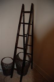 Wicker baskets and ladder decor
