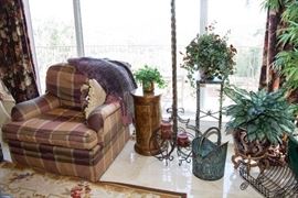 From Left To Right: Burl Veneer Pedestal Stand (26"h x 13" diameter). $110.00. Iron Floor Lamp: $50.00 Coal Basket: $45.00. Black Iron Plant Stand (32"h): $90.00. Tall Iron Candle Stick: $16.00. Small Iron Candle Stick: $12.00. Faux Plant, Pot and Stand: $75.00. Iron Scroll Basket: $30.00. Faux Bamboo In Pot. $75.00