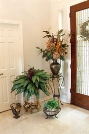 Iron Wire Urn w/Orbs: $30.00. Curved Leg Plant Stand: $60.00. Magnolia Arrangement and Urn: $80.00. Faux Dieffenbachia Plant and Wood Stand: $60.00