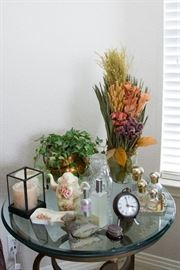 3 Leg Round Iron Leaf Motif Iron and Glass Top/Iron Bedside Table (28"h x 27" dia.): $180.00 Bedside Tea Pot: $15.00 Bedside Glasses Tray: $8.00 Bedside4 Crystal Water/Glass: $18.00 Ivy In Cooper Pot: $15.00 5 pc. Table Top Perfume Set: $30.00 