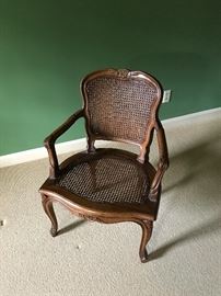 cane back and bottom chair