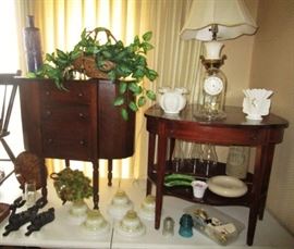 Vintage sewing stand, pair of side tables, antique lampshades, Fenton silver crest vase, cast iron candle holders, lamp, kerosene lamp globes, etc.