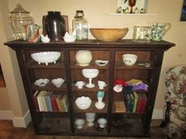 primitive cupboard top, antique stoneware, glass counter display jar, wooden bread bowl & paddle, milk glass, antique books