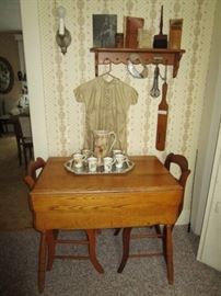 Drop leaf table, antique chocolate set, antique romper, etc.