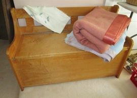 Wooden bench w/ cedar lined storage, blankets
