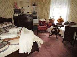 Antique full size bed, chest of drawers & desk, parlor table, antique upholstered chair, antique corner display, basket purses