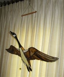Stained glass flying bird