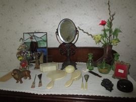 Antique dresser mirror, cast iron lion bank, celluloid dresser set, vaseline glass dresser set, vintage shoe