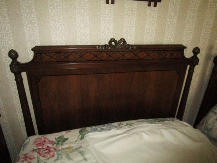 Close up view of antique twin bed