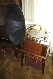 Reproduction (from 1970's) turn table w/ horn, speakers inside cabinet.