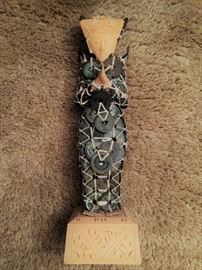 Vintage Baliness Dewi Sri stature with antique Qing dynasty coins, some dated to 1600s,