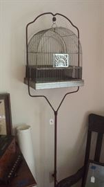 Iron bird stand in old red and a cage that fits. (not sure if they started out together)