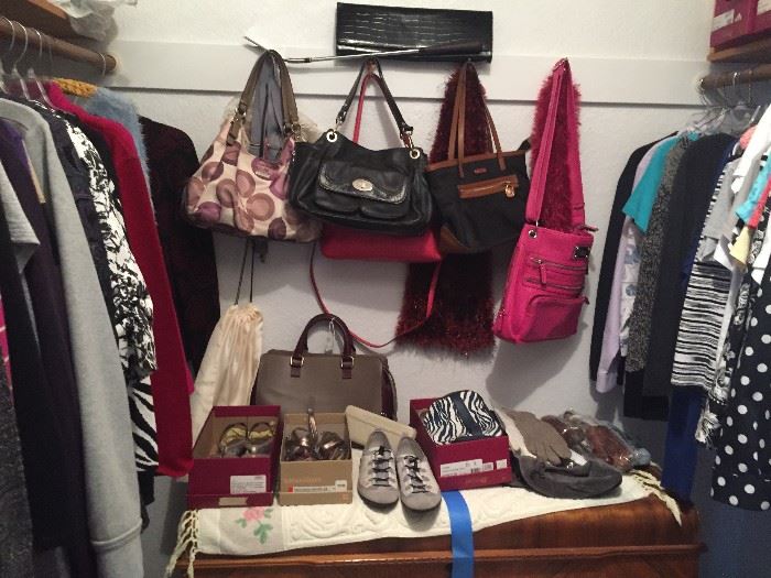 Nice purses/handbags, some Coach. shoes are size 9 1/2 in this closet. All in great condition. Many are in their original boxes. All bought at Nordstroms. 