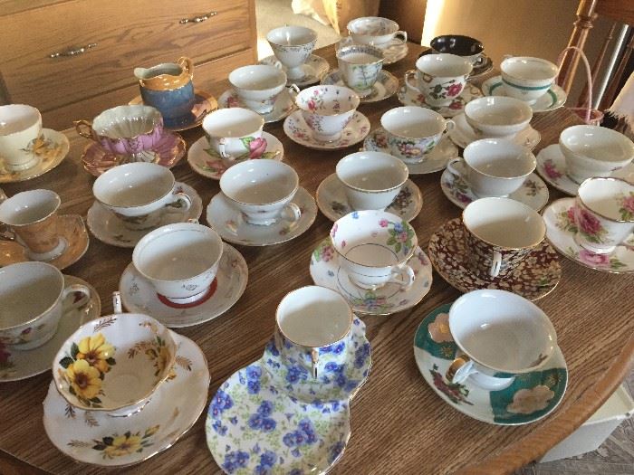 Table filled with teacups  All $6.00 each